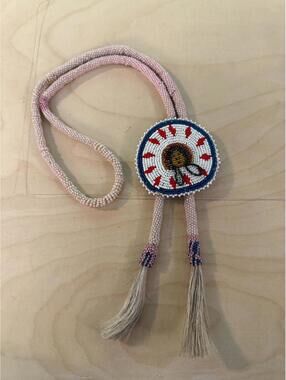 Vintage beaded Native American medallion bolo Navajo necklace horse hair tassel